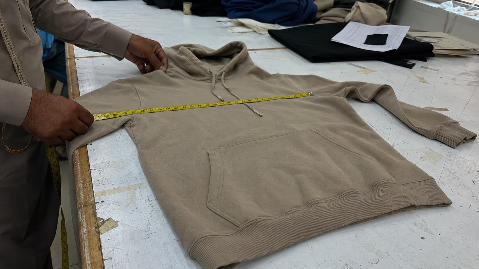 Garment measurement checked against product requirements